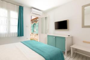 Postel nebo postele na pokoji v ubytování Monza House Otel