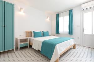 Postel nebo postele na pokoji v ubytování Monza House Otel