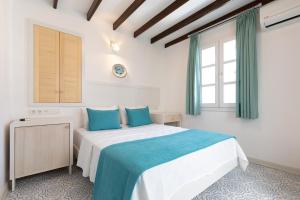 Postel nebo postele na pokoji v ubytování Monza House Otel