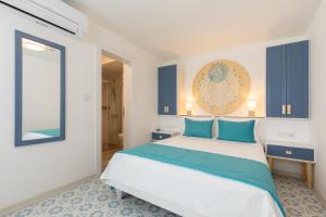 Postel nebo postele na pokoji v ubytování Monza House Otel