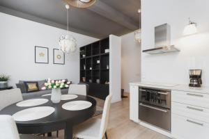 Kuchyň nebo kuchyňský kout v ubytování Apartment Krakow Arianska by Renters Prestige