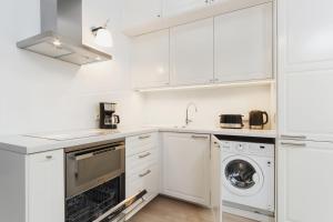 Kuchyň nebo kuchyňský kout v ubytování Apartment Krakow Arianska by Renters Prestige