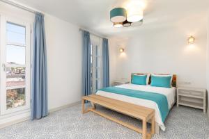 Postel nebo postele na pokoji v ubytování Monza House Otel