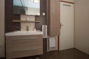 Koupelna v ubytování Kolenda Apartment + 14 fotografií