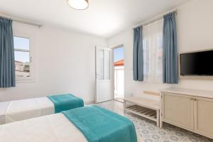 Postel nebo postele na pokoji v ubytování Monza House Otel