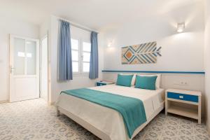 Postel nebo postele na pokoji v ubytování Monza House Otel