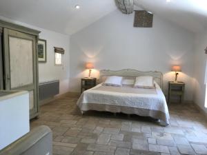 Cama o camas de una habitación en Le Moulin des Sources