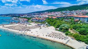 an aerial view of a beach in a resort at Delfin Port Apartments - Prime Location & Parking & Pet Friendly in Sveti Vlas