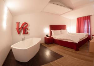 Hotel Gabbani 객실 침대