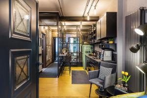 a room with a kitchen and a living room at 5 Vintage Guest House in Sofia