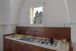 Kuchnia lub aneks kuchenny w obiekcie Palazzo Le Cupole by Wonderful Italy