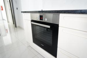 Kuchnia lub aneks kuchenny w obiekcie Funtana Appartements an der 1 Reihe vom Meer