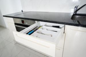 Kuchnia lub aneks kuchenny w obiekcie Funtana Appartements an der 1 Reihe vom Meer