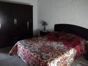 A bed or beds in a room at Completa casa en Colonia para 6 personas