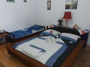 Posteľ alebo postele v izbe v ubytovaní Traianov most