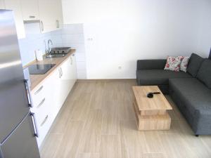 Kuchyňa alebo kuchynka v ubytovaní Apartmani Krajinovic