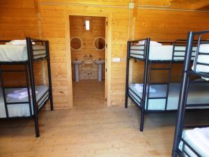Un ou plusieurs lits superposés dans un hébergement de l'établissement Alojamiento Rural Coto de la Isleta