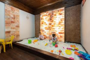 Postel nebo postele na pokoji v ubytování Allium Apartment
