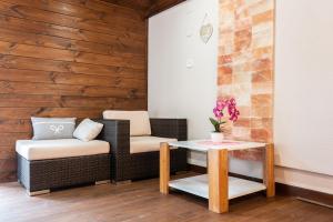 Posezení v ubytování Allium Apartment