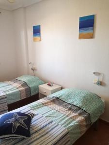 Cama ou camas em um quarto em Appartement Mojacar Playa Marina de la Torre