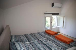 Katil atau katil-katil dalam bilik di Villa Liberte