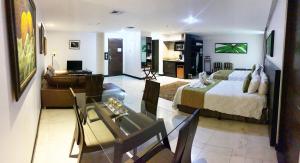 Uma cama ou camas num quarto em Studio Hotel Boutique