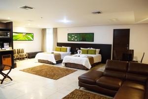 Uma cama ou camas num quarto em Studio Hotel Boutique