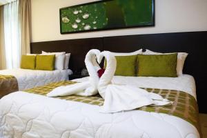Uma cama ou camas num quarto em Studio Hotel Boutique