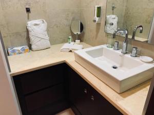 Uma casa de banho em Studio Hotel Boutique