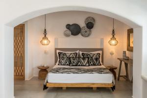 Ένα ή περισσότερα κρεβάτια σε δωμάτιο στο Virtu Suites