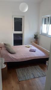 Postel nebo postele na pokoji v ubytování Apartment Jasmina