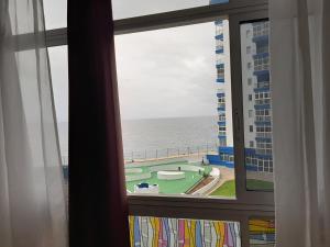 a view of the ocean from a hotel room window at Paraiso in Tacoronte