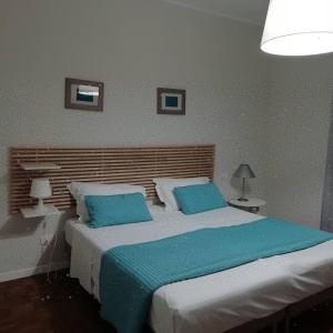 Letto o letti in una camera di Home Scala dei Turchi B&B