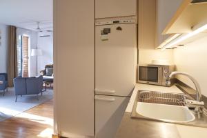 Kuchyňa alebo kuchynka v ubytovaní Spacious & Comfortable flat in centric Eixample