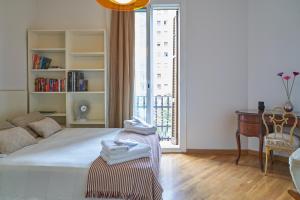 Posteľ alebo postele v izbe v ubytovaní Spacious & Comfortable flat in centric Eixample