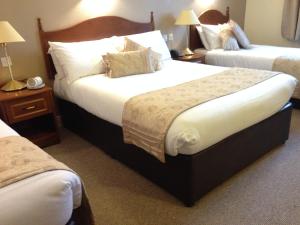 Ліжко або ліжка в номері Hotel Curracloe