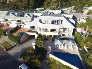an aerial view of a house with a swimming pool at Oceans Eleven at Iluka Resort Apartments in Palm Beach