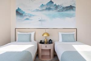 Voodi või voodid majutusasutuse The Parc Hotel toas