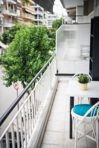 Balcon ou terrasse dans l'établissement Grey & Cozy Luxury Apartment