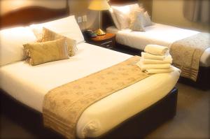 Ліжко або ліжка в номері Hotel Curracloe