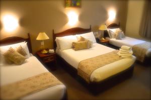 Ліжко або ліжка в номері Hotel Curracloe