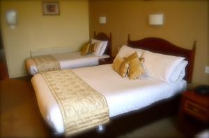 Ліжко або ліжка в номері Hotel Curracloe