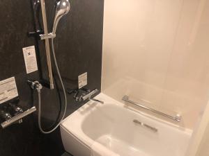 Koupelna v ubytování Kobe Luminous Hotel Sannomiya + 37 fotografií
