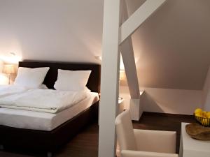 Giường trong phòng chung tại Gasthaus Poelt