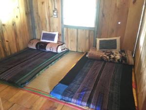 מיטה או מיטות בחדר ב-Hello Mu Cang Chai Homestay