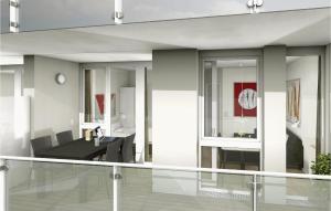 a balcony with a dining room and a dining table at Highend Travemünde - Whg 203 in Travemünde