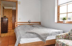 Postel nebo postele na pokoji v ubytování 0-Bedroom Holiday Home In Borrby + 5 fotografií
