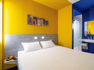 Postel nebo postele na pokoji v ubytování ibis budget Amsterdam Airport