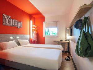 Postel nebo postele na pokoji v ubytování ibis budget Amsterdam Airport