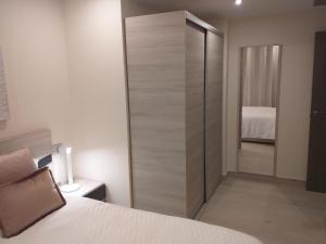 Posteľ alebo postele v izbe v ubytovaní Apartamentos Vacacionales Joctis, 2º A